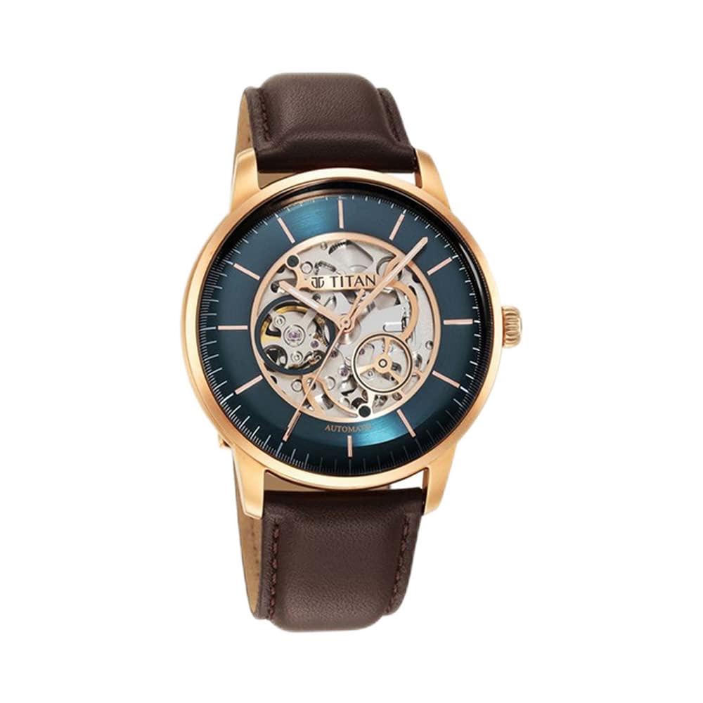 Titan Mechanical Skeleton Automatic Teal Blue Dial Brown Leather Strap Watch for Men – NT90110WL04 Titan Mechanical Skeleton Automatic Teal Blue Dial Brown Leather Strap Watch for Men – NT90110WL04