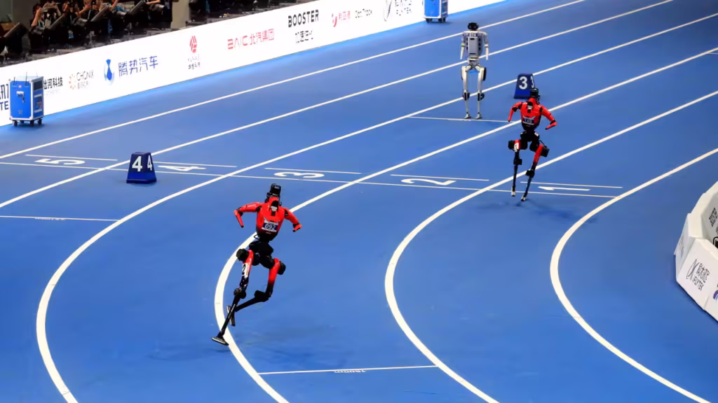 Human-like robots race on a running track