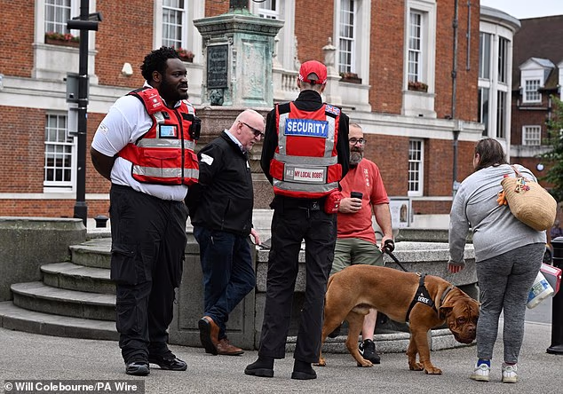 Two of the 'security operatives' patrolling Essex towns as part of Operation Vanguard. There is no suggestion the two guards pictured are those referenced in the article